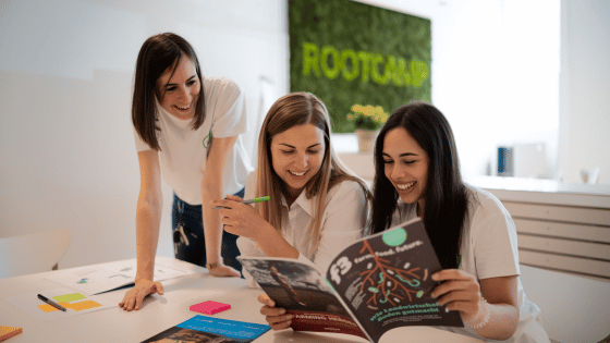 RootCamp team reading the Trend Report Magazine