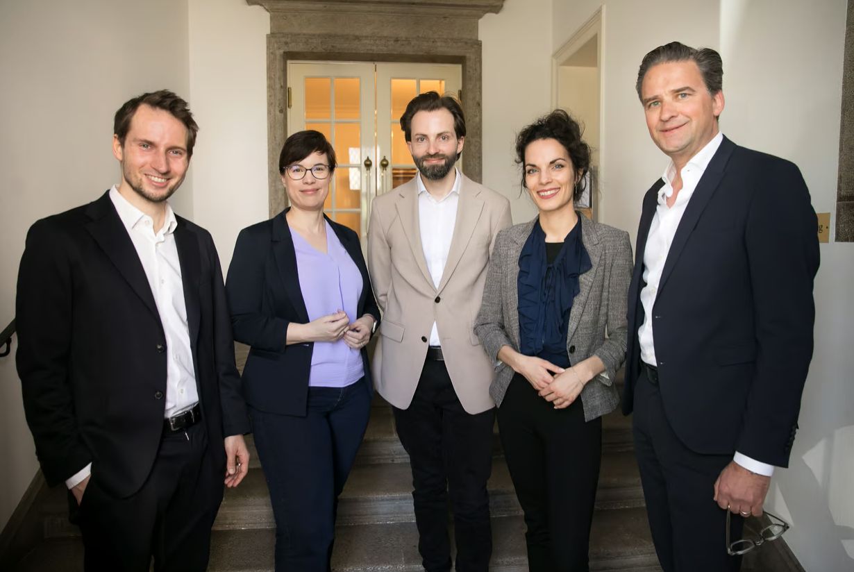 Team picture with the startup team and investors