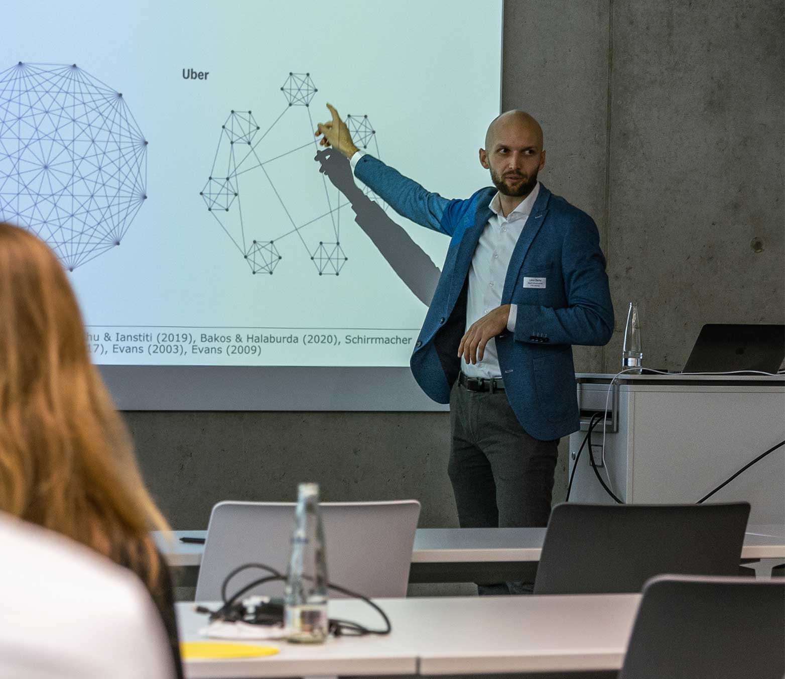 A photo of director consulting Lukas Zechel