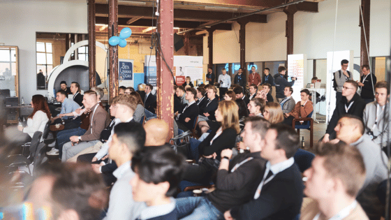 A photo of SpinLab as event location with an audience