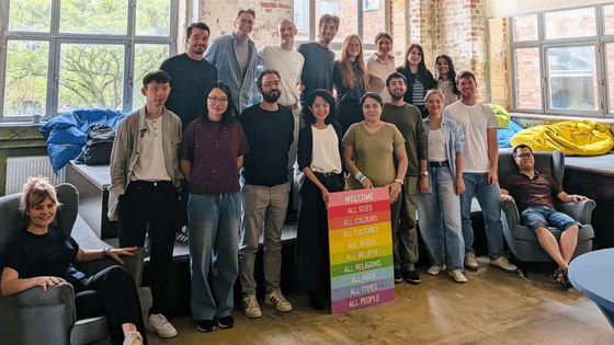 A group photo of the summer school teams and spinlab team